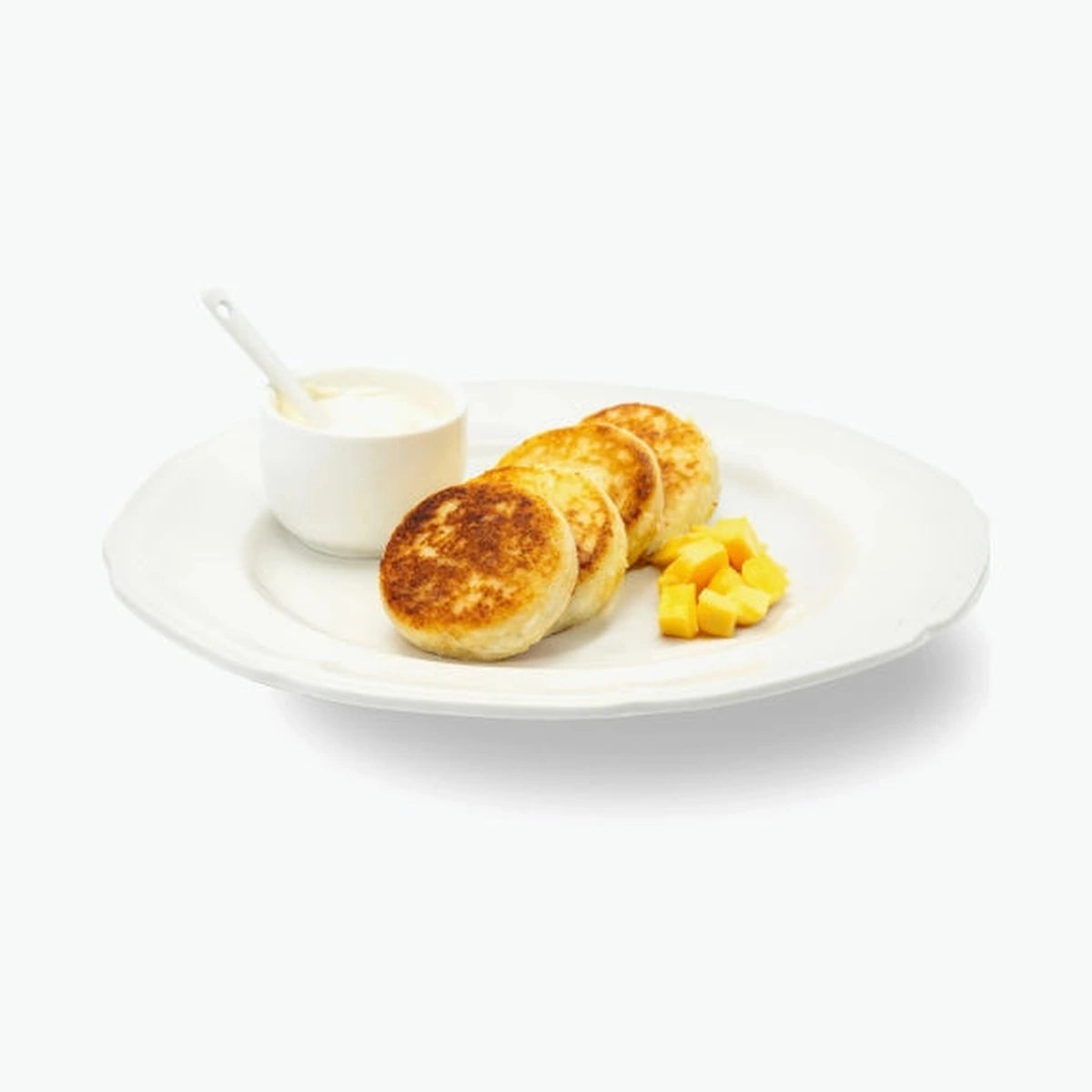 Handmade Sirniki with mango pieces, 8 pieces