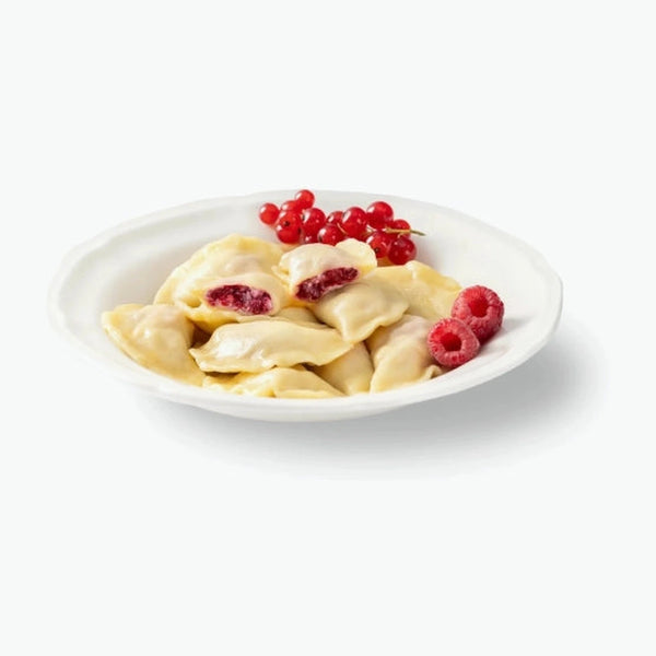 Vareniki with quark and raspberries, handmade