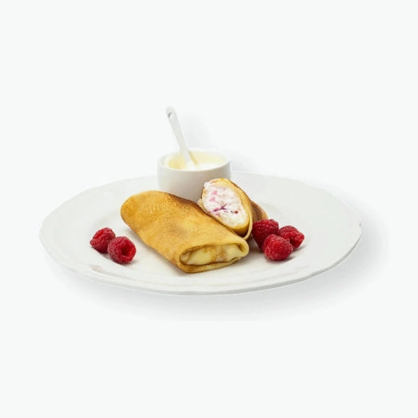 Blinis with quark and raspberry filling, handmade 