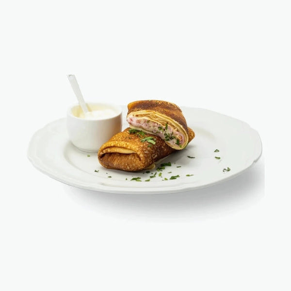 Blinis with ham and cheese filling, handmade 