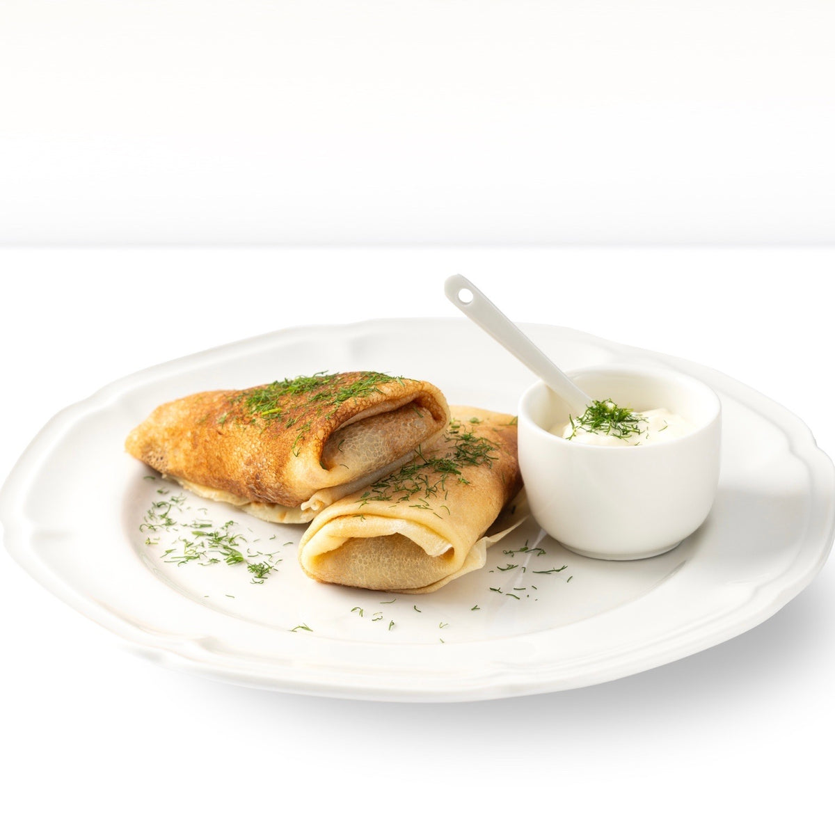 Handgemachte Blinis mit Fleischfüllung